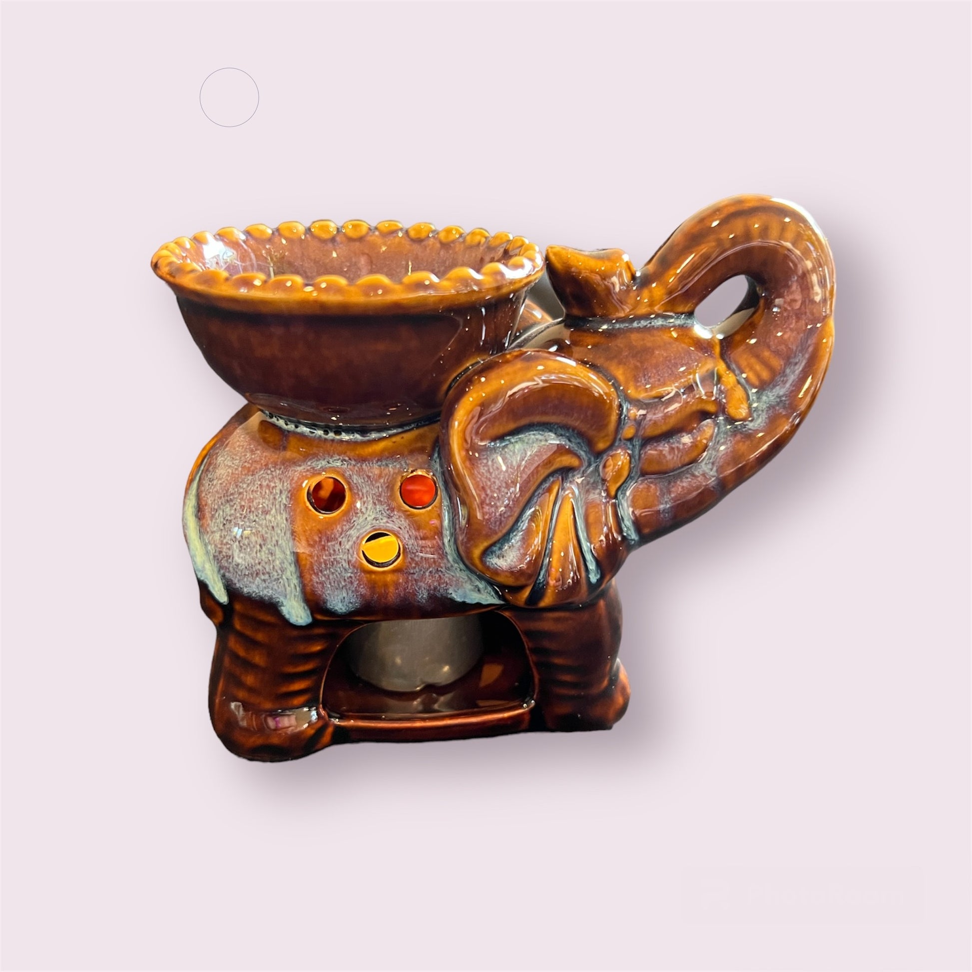 Elephant wax burner - brown with blue highlights.